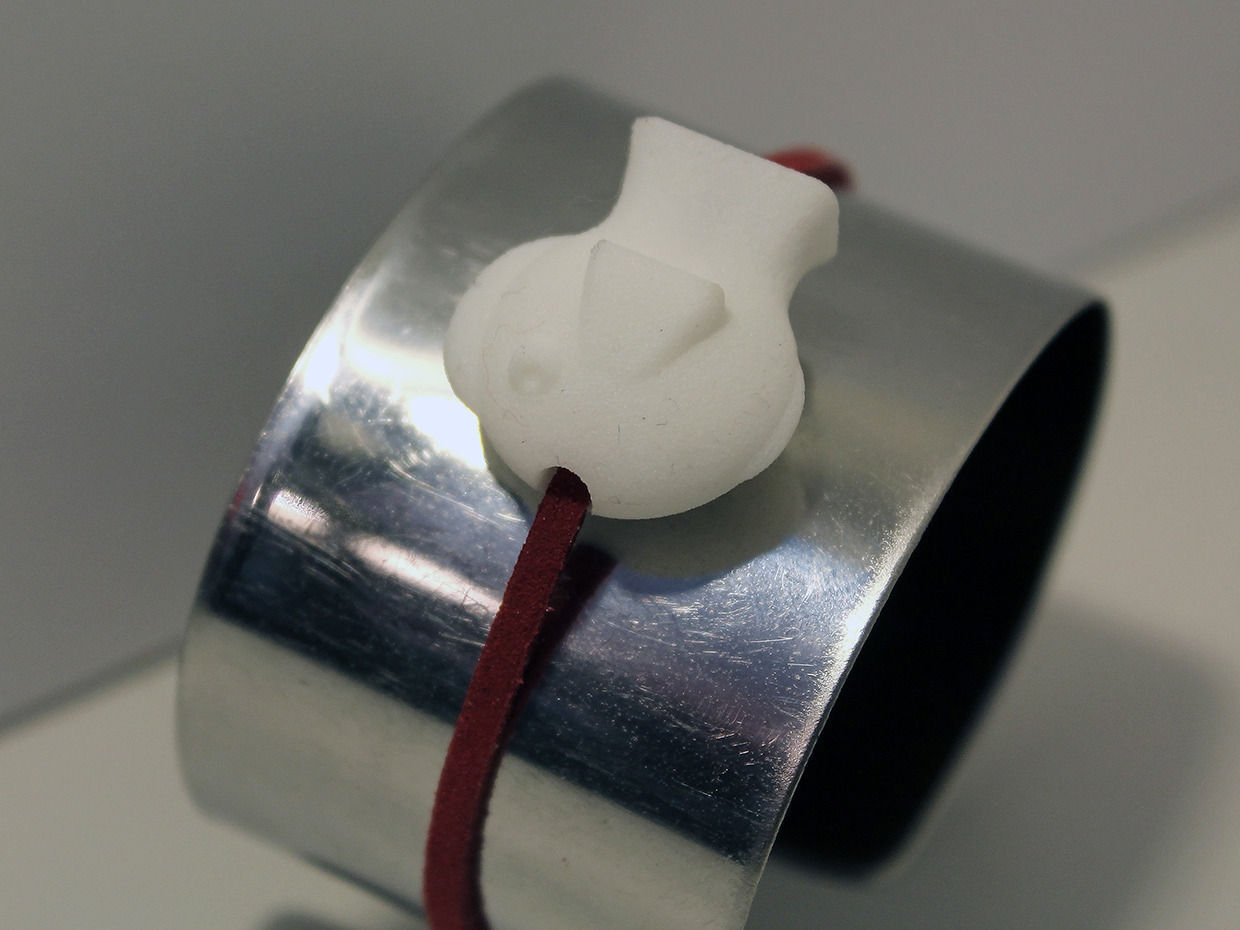 Fishy cuff bracelet with button and cord